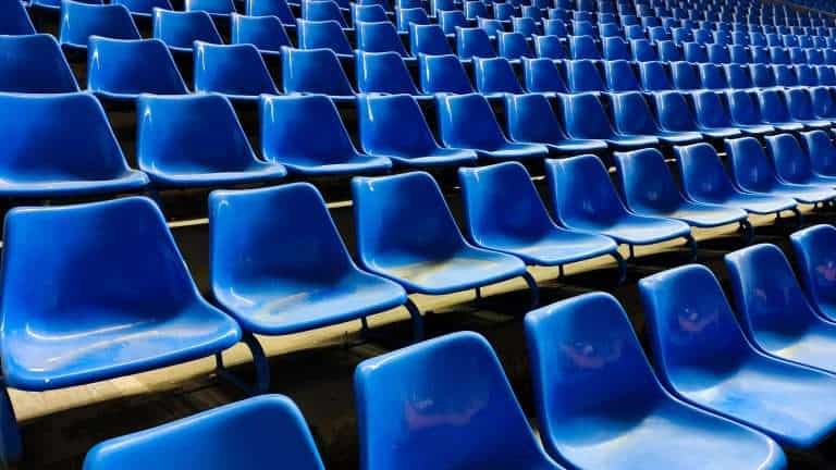 Empty stadium seats in a sports stadium or arena