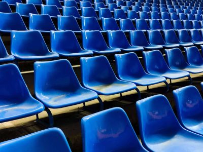 Empty stadium seats in a sports stadium or arena