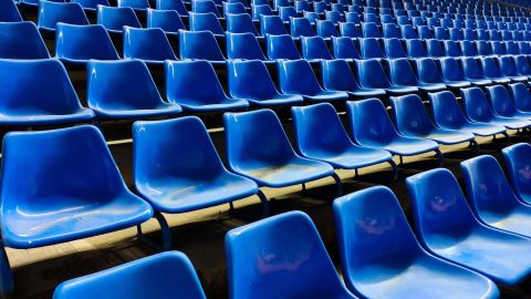 Empty stadium seats in a sports stadium or arena